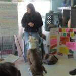 Malo helping teach behavior classes at the SPCA.